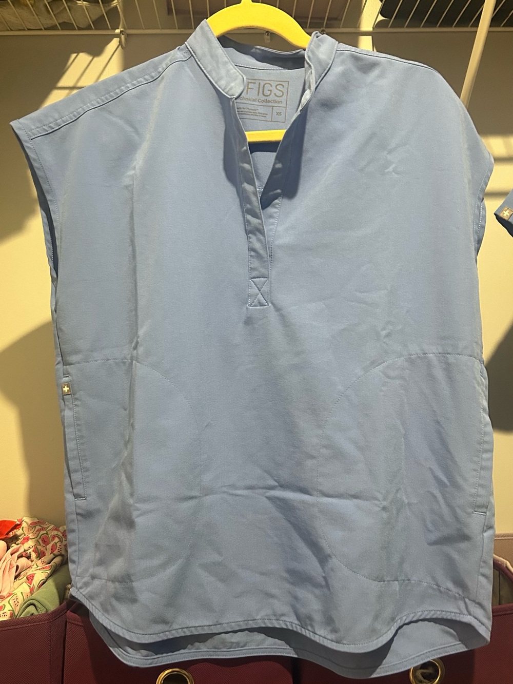 FIGS Women’s Ciel Blue Rafeala Sleeveless Scrub Top